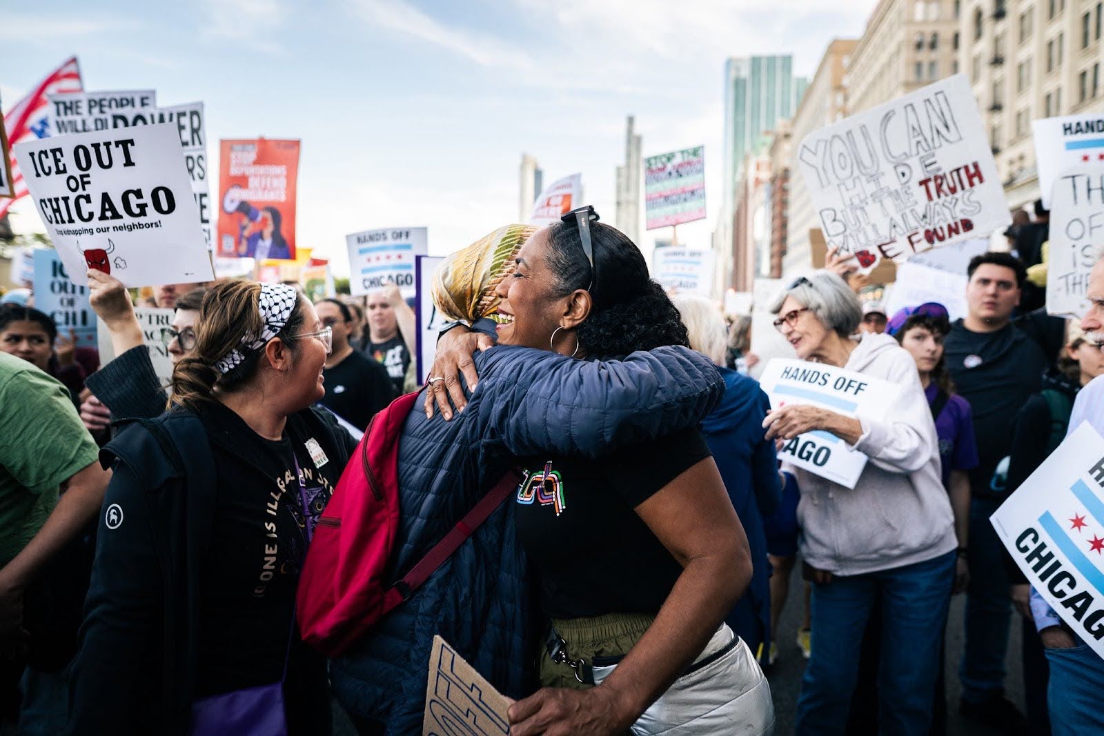 Juliana hugging a protest attendee